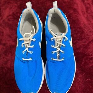 Nike Blue and Gray Athletic Shoes 
Size 7Y which is 8.5 in women’s.